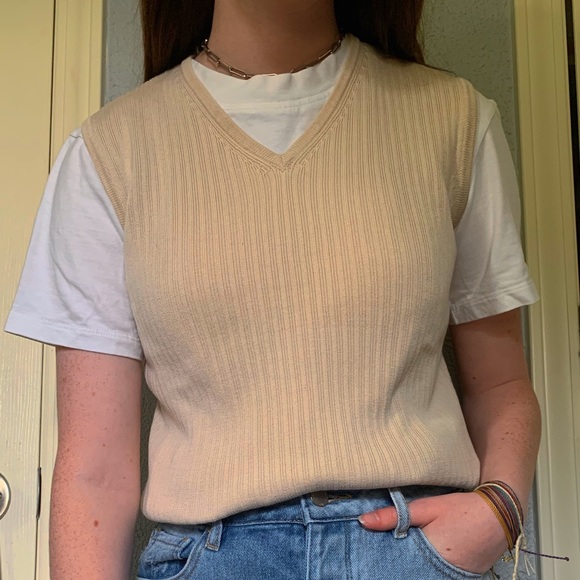 beige sweater vest